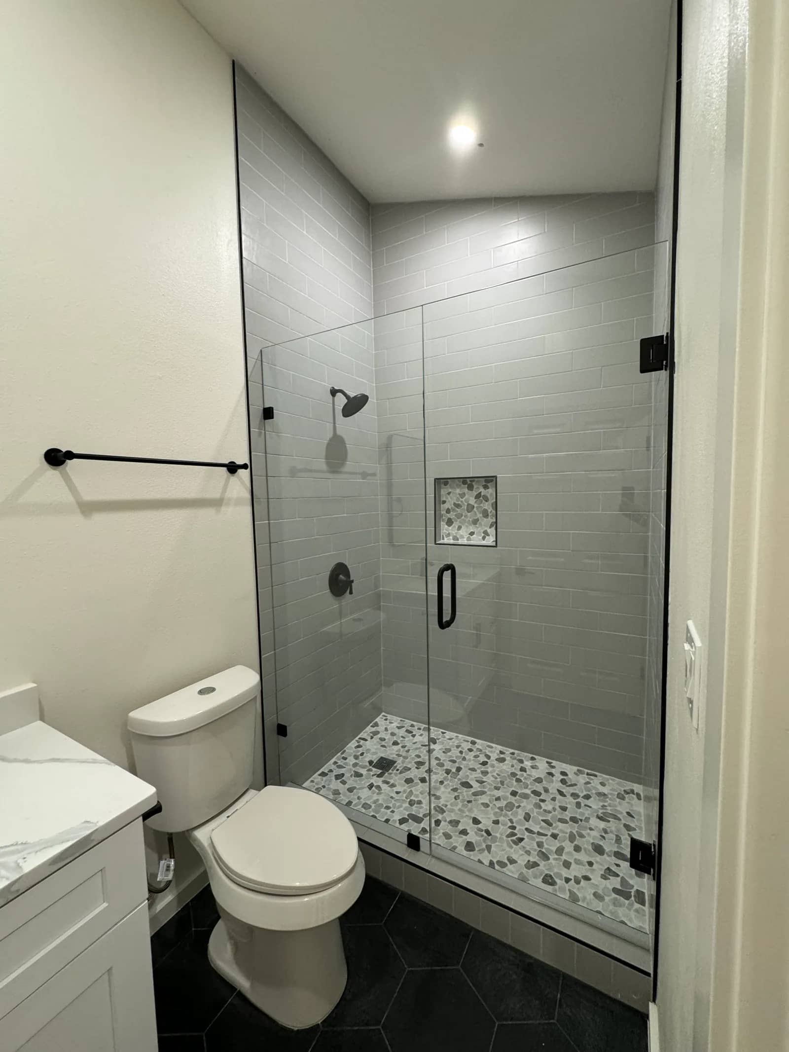 Finished frameless shower glass installation